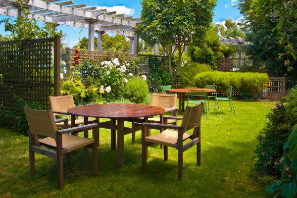 Dining Table set in Lush Landscaped Garden